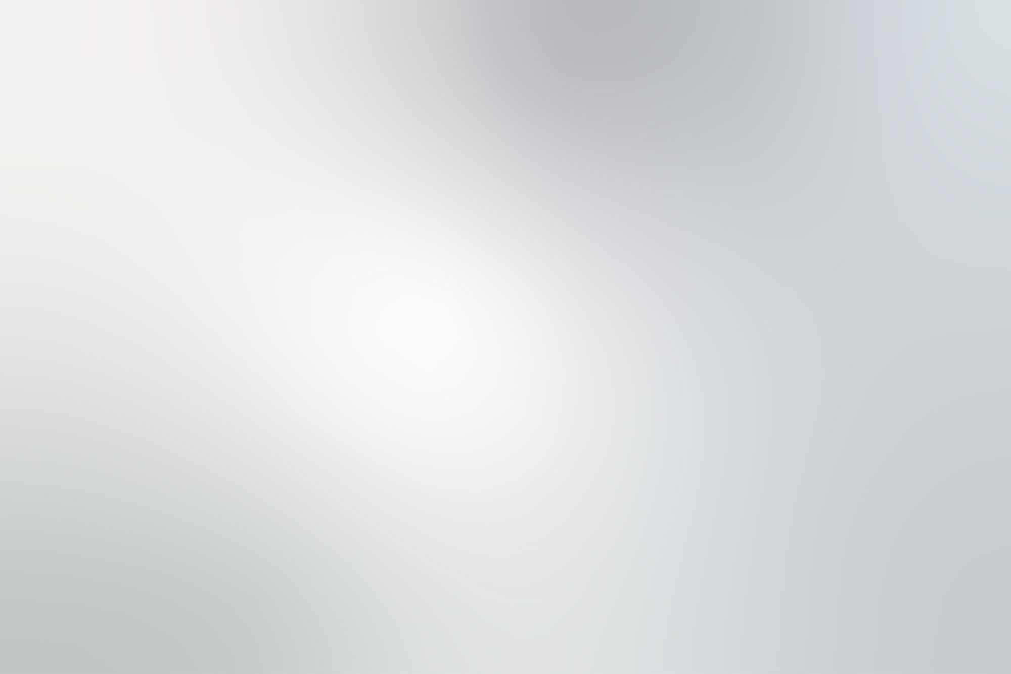 White grey gradient abstract background with soft glowing backdrop, background texture for design